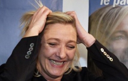 1-marine-le-pen-reacts-at-her-campaign-headquarters-in-henin-beaumont_457455